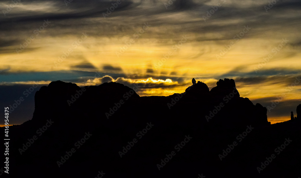 Evening sunset against the backdrop of the mountain landscape, and the red mountains. Canyonlands, Moab, Utah