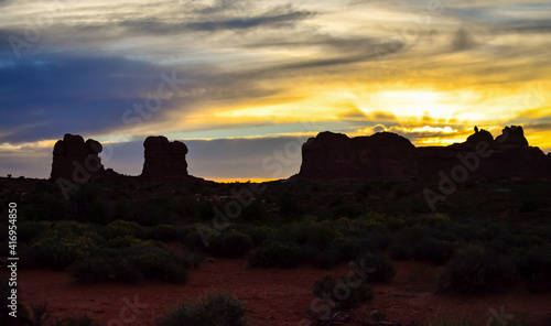 Evening sunset against the backdrop of the mountain landscape, and the red mountains. Canyonlands, Moab, Utah