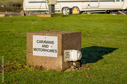Принти на полотні Caravan, motor homes and RV electrical power hook up plug on a site in Scotland