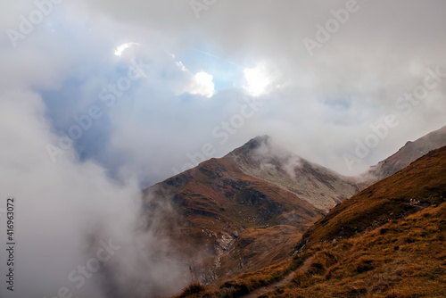 wonderful scenery into the Fagaras mountains Romania, with the clouds between the rocks