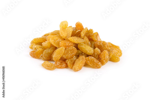 Dried raisins yellow raisins on a white background.