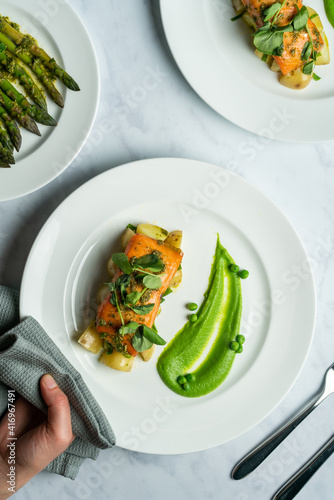 Fine dining Salmon and green pea puree 
