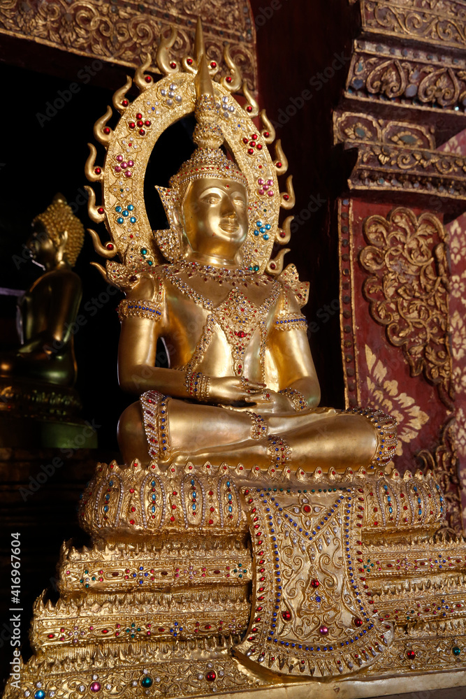 Fototapeta premium Buddha statue in Wat Chedi Luang, Chiang Mai. Thailand. 25.02.2017
