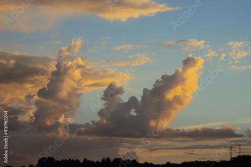 The beautiful landscape shows the sunlight leaving and the last reflections in the clouds in a beautiful profusion of colors. Sunrise or sunset turns the horizon into a true work of art.