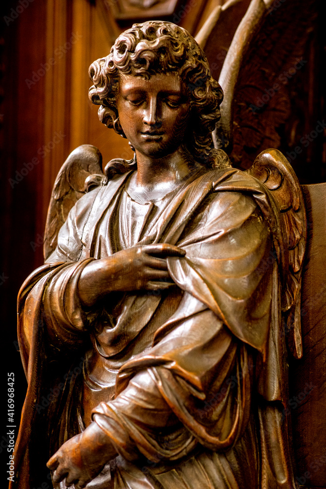 Obraz premium St James's catholic church, Antwerp, Belgium. Detail of an angel statue. 26.05.2018