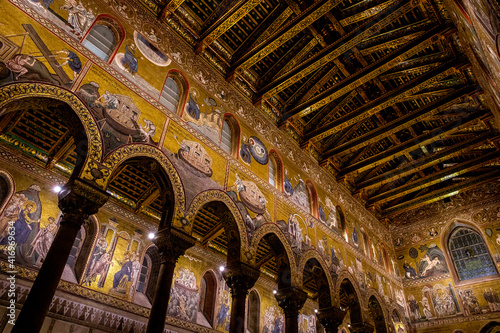 Santa Maria Nuova cathedral, Monreale, Sicily, Italy. Nave pillars, arches and mosaics. 31.07.2018