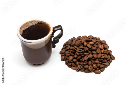 cup of espresso coffee and coffee grains on white background