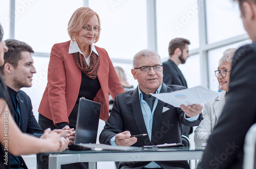 Photography Businessman is reading contract in modern office