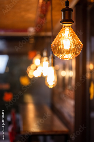 retro light bulb with warm light in a cafe