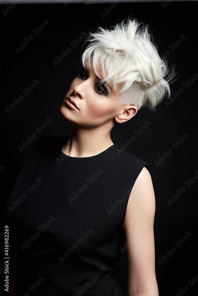 fashion beauty portrait of young woman with stylish short haircut