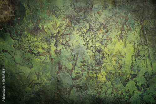 Green gloom slime on basement wall texture background horror