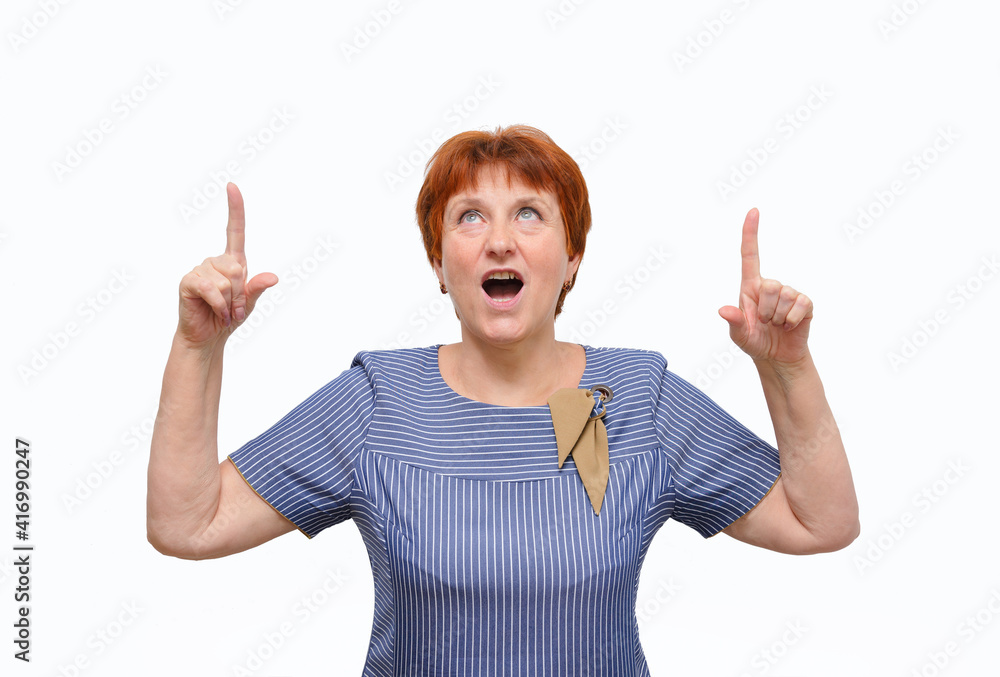  woman 60 years old with a blue dress on a white background shows her hands up