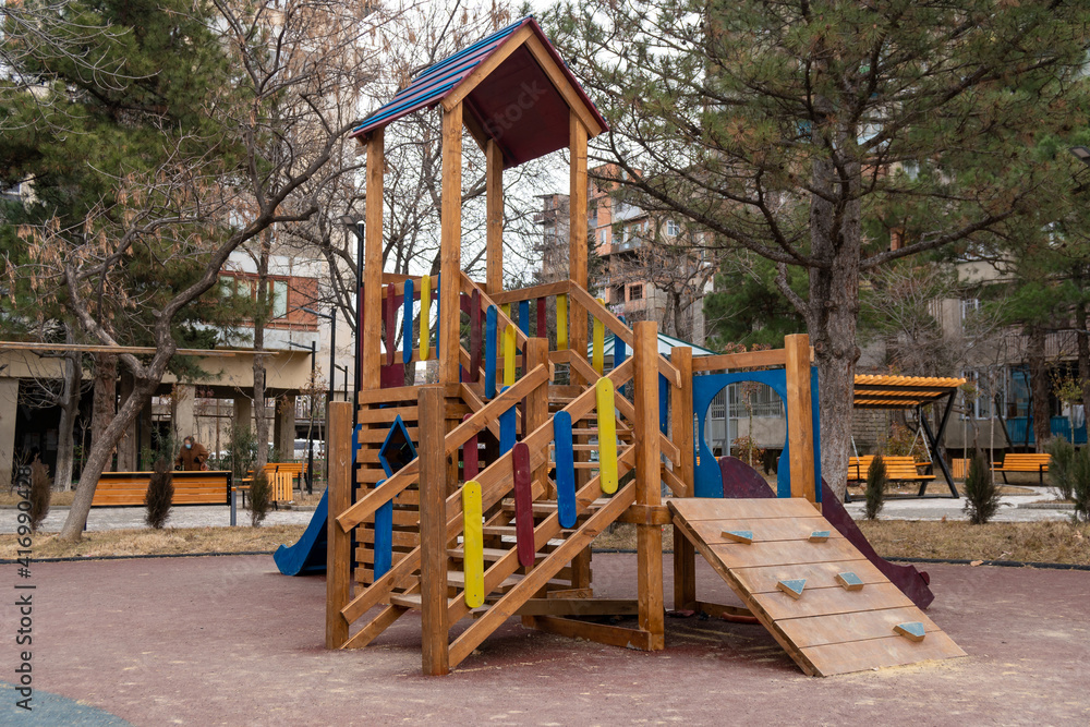 Empty wooden playground in the park during coronavirus. Empty wooden playground in the park during coronavirus.