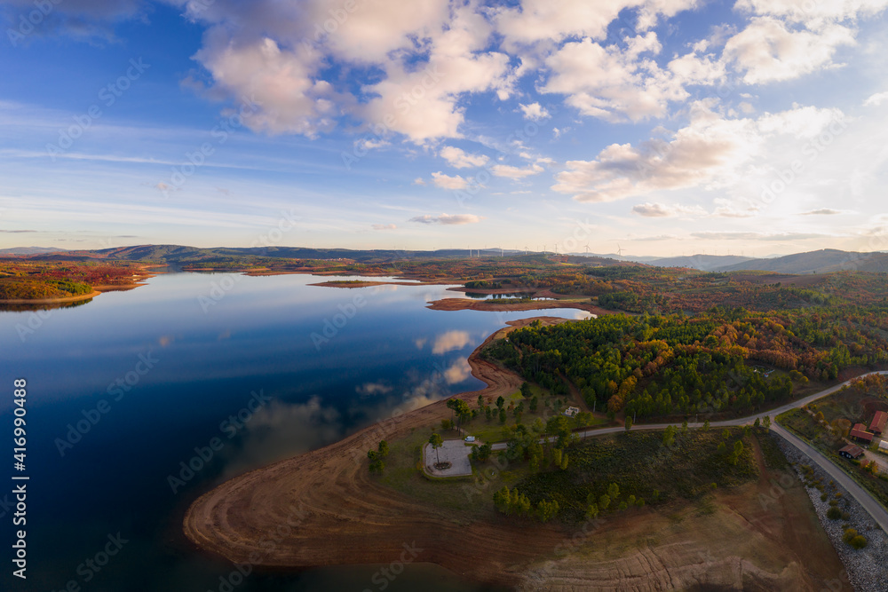Drone aerial panoramic view of Sabugal Dam lake reservoir with perfect reflection, in Portugal Drone aerial panoramic view of Sabugal Dam lake reservoir with perfect reflection, in Portugal