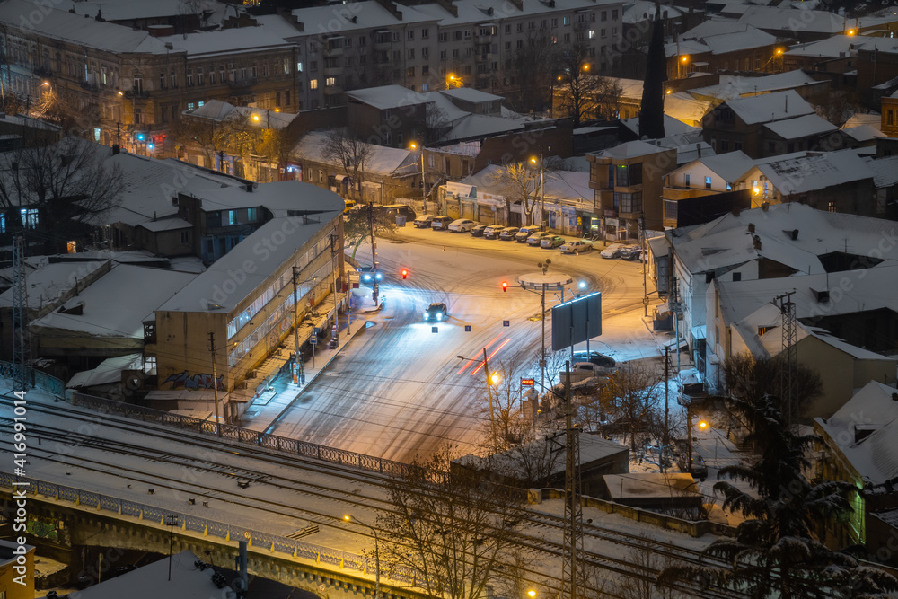 Fototapeta premium Snow in the night city