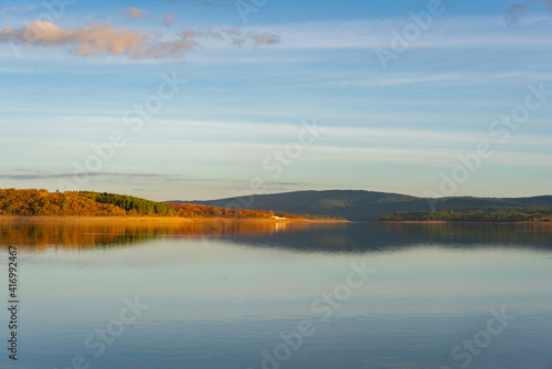 Lake reservoir dam landscape view at sunset during autumn fall in Sabugal Dam  Portugal