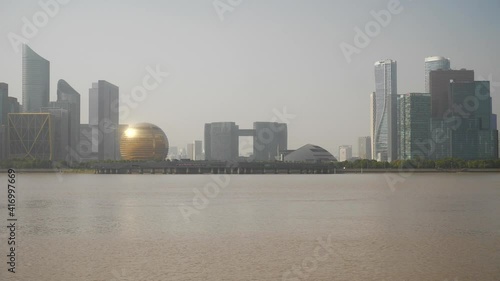sunny day time hangzhou city famous downtown modern buildings riverside bay slow motion panorama 4k china photo