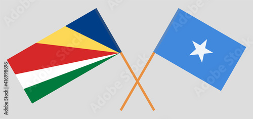 Crossed flags of Seychelles and Somalia. Official colors. Correct proportion © valyalkin