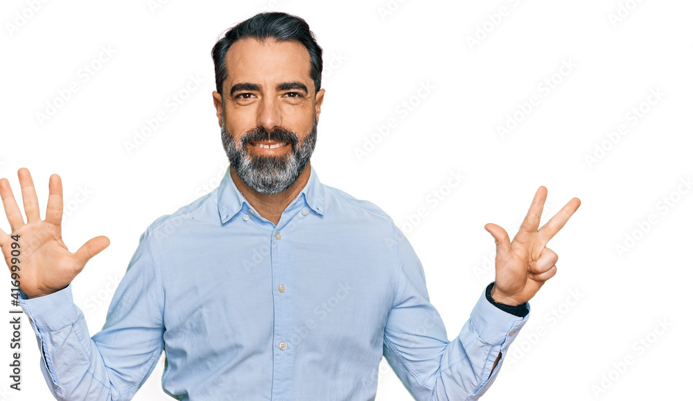 Middle aged man with beard wearing business shirt showing and pointing up with fingers number eight while smiling confident and happy. Middle aged man with beard wearing business shirt showing and pointing up with fingers number eight while smiling confident and happy.