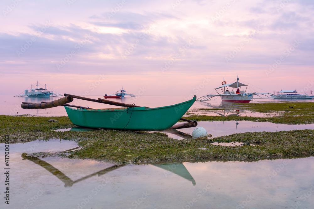 Tratitional Filipino boats in the morning at Bohol Island Tratitional Filipino boats in the morning at Bohol Island