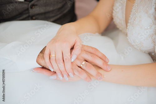 hands of the newlyweds. romance. wedding rings
