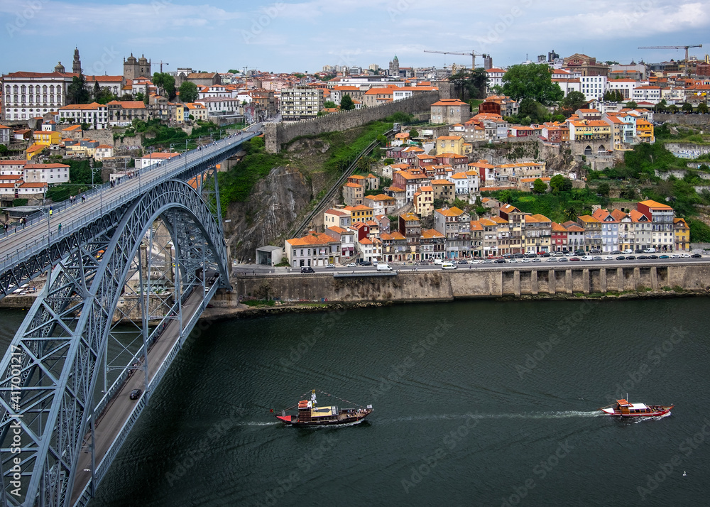 Spring in Portugal. Duoro river and view of the rooftops of the old city of Porto. Ponte Luís I. Vila Nova de Gaia bridge. Portugal.
