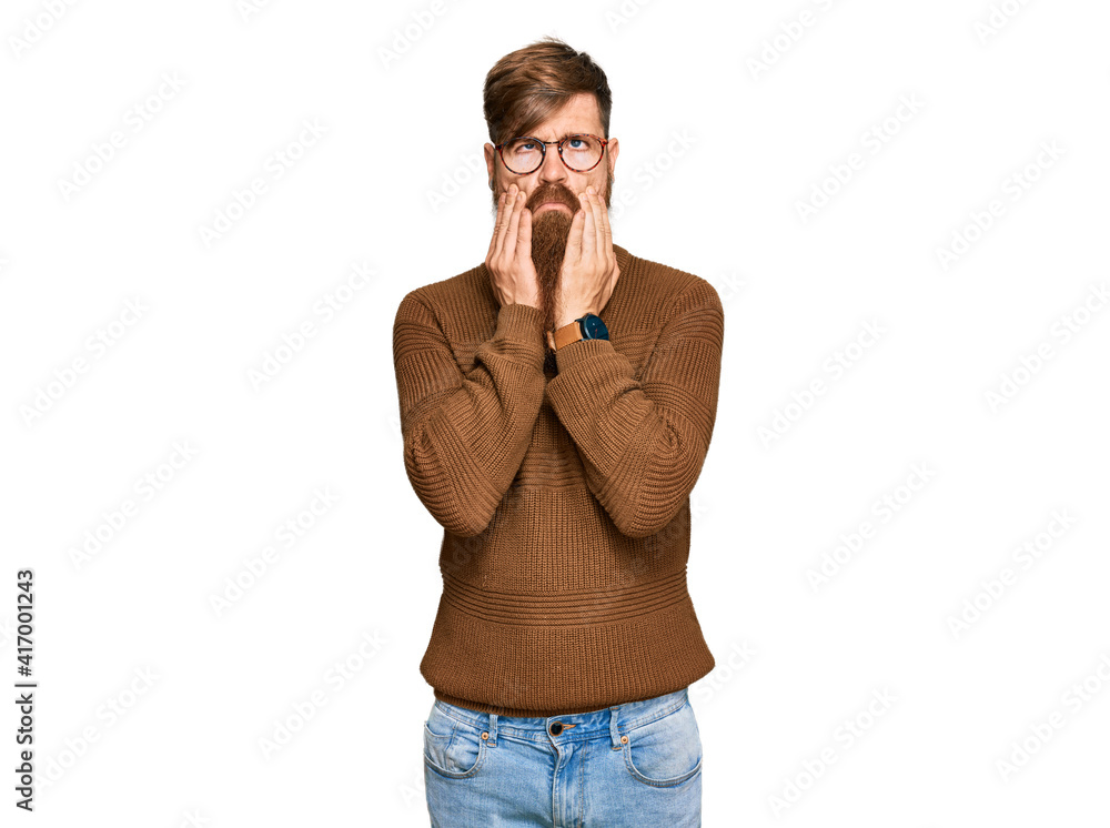 Young irish redhead man wearing casual clothes and glasses tired hands covering face, depression and sadness, upset and irritated for problem Young irish redhead man wearing casual clothes and glasses tired hands covering face, depression and sadness, upset and irritated for problem