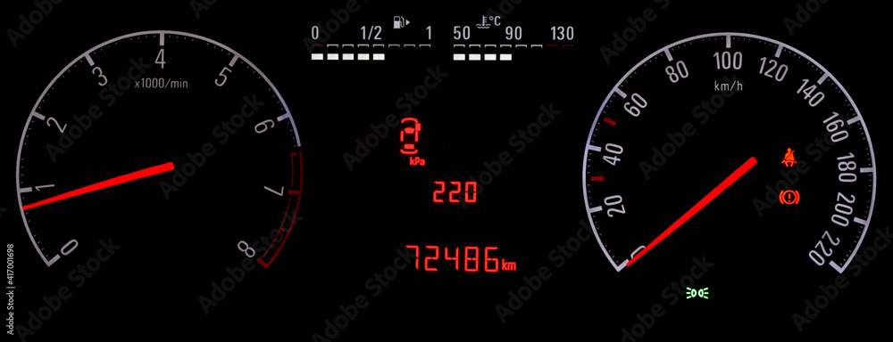 TPMS (Tyre Pressure Monitoring System) display on car dashboard. Pressure measurement given in kilopascal. Car instrument panel with speedometer, tachometer, odometer, car temperature and fuel gauge. 