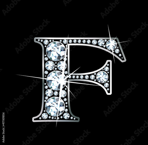 A stunningly beautiful "F" set in diamonds and silver.