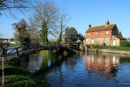 Stoke Lock Cottage on the River Wey navigation, Guildford, Surrey, UK