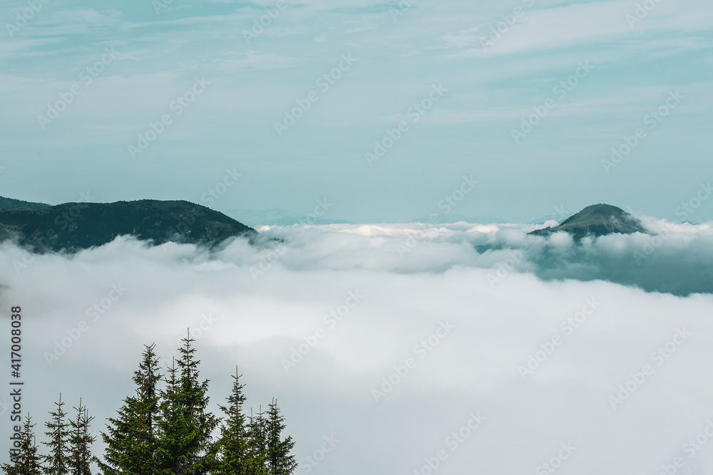 Fototapeta premium Kitzbühel Alps above the clouds , Austria.