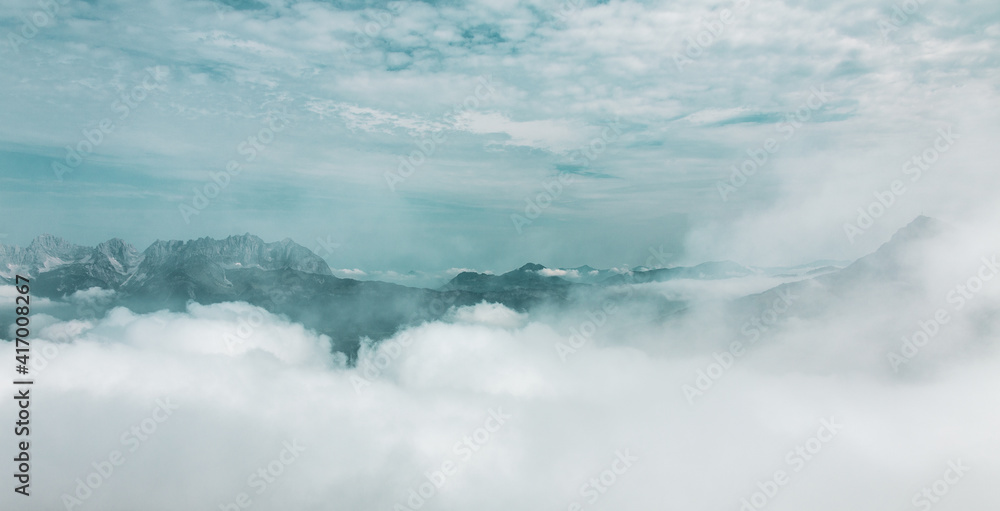 Kitzbühel Alps above the clouds , Austria.