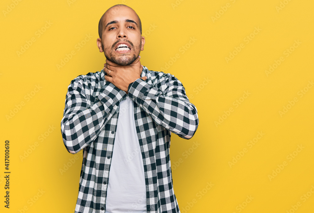 Hispanic adult man wearing casual clothes shouting and suffocate because painful strangle. health problem. asphyxiate and suicide concept. Hispanic adult man wearing casual clothes shouting and suffocate because painful strangle. health problem. asphyxiate and suicide concept.