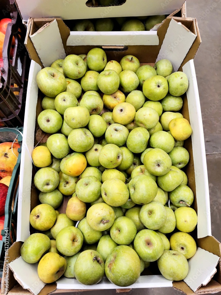 Large box with fresh apples