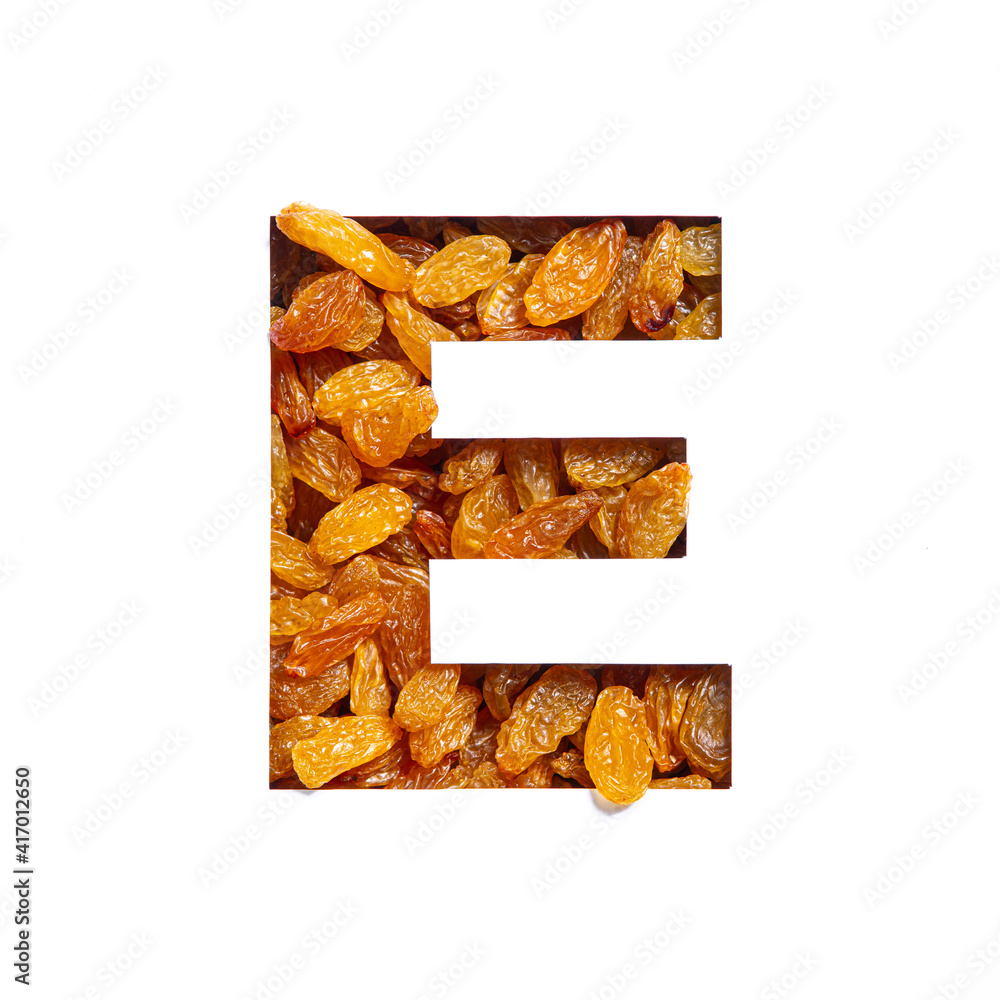 Letter E of English alphabet made of raisins and paper cut isolated on ...