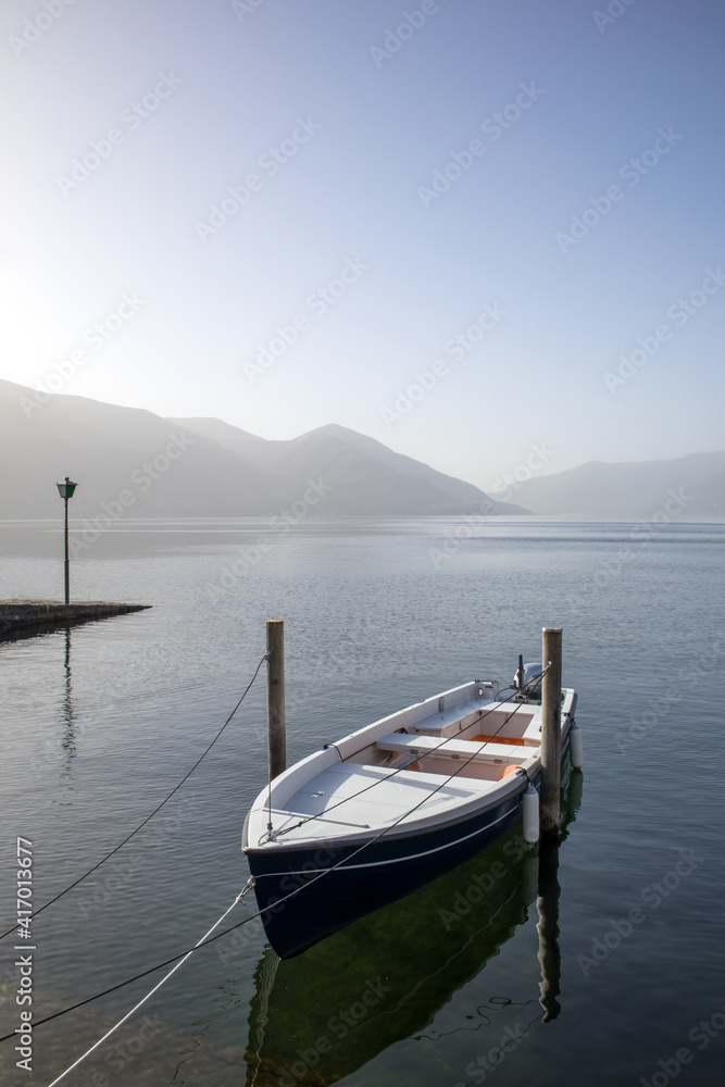 Small boat moored on the lake