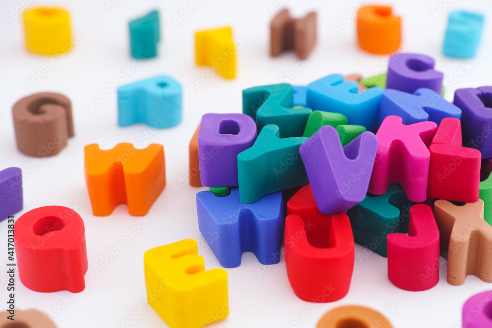 Naklejka premium Colorful polymer clay letters in a pile