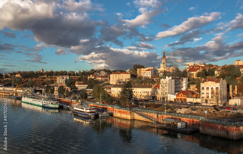 View of the city of Belgrade from Branko's bridge, and across the river Sava. Panorama of the city on a beautiful day with fantastic clouds.
