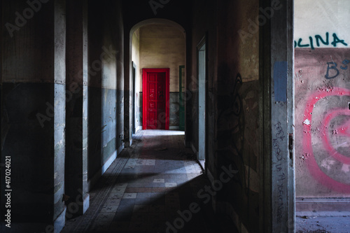 Red door in an haunted house - freaky freak