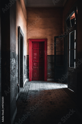 Red door in an haunted house - freaky freak © jeremie