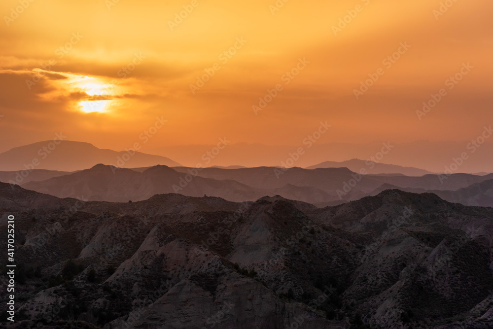 Sunset landscape over the badlands of the Granada Geopark.