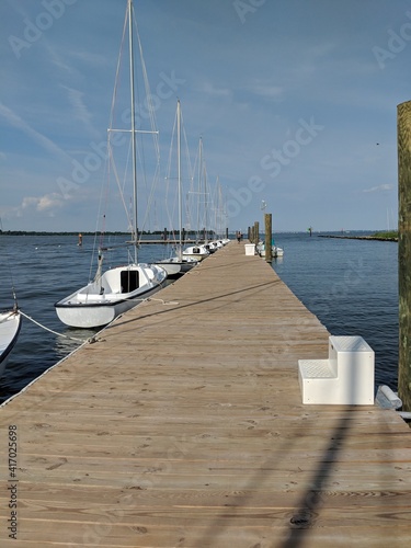 By a Boat on a Dock on the Bay