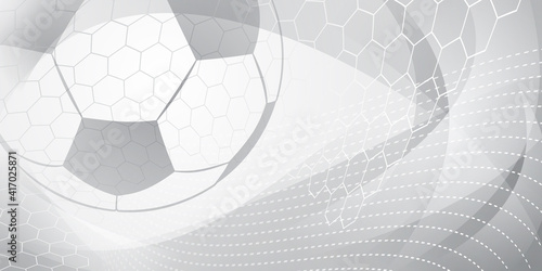 Football or soccer background with big ball in gray colors