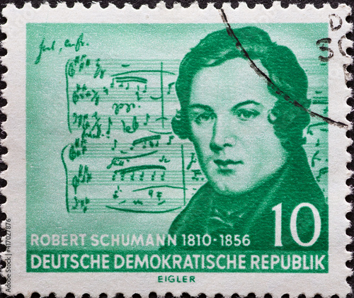 Photography a postage stamp from Germany, GDR showing a half-length portrait from half-length portrait by Robert Schumann, notes from Eichendorff's Mondnacht