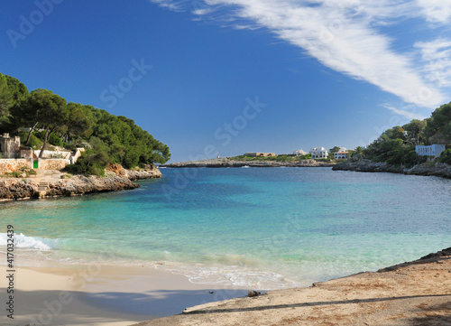 Turquoise Water On The Sand Beach In The Bay Of Cala Gran On Balearic Island Mallorca On A Sunny Winter Day With A Clear Blue Sky