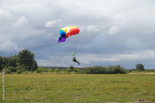 parachute landing in a field
