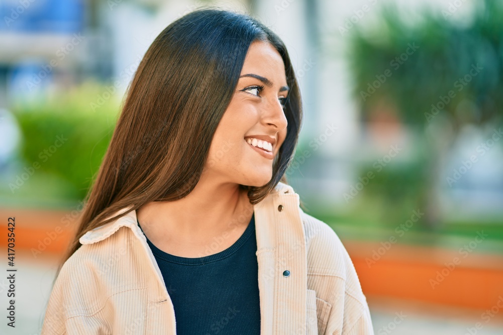 Young hispanic girl smiling happy standing at the park Young hispanic girl smiling happy standing at the park