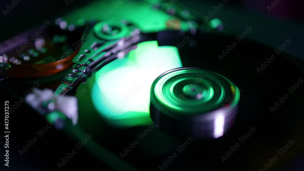 close-up view of working opened hard disk drive (looping) close-up view of working opened hard disk drive (looping)