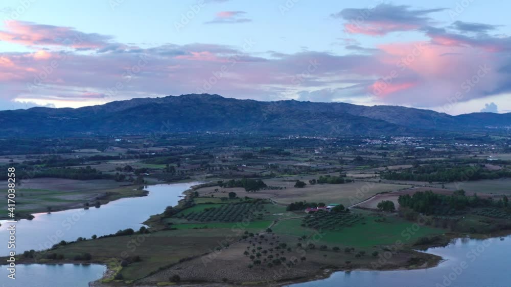 Lake drone aerial view of mountain panorama landscape at sunset in Marateca Dam in Castelo Branco, Portugal Lake drone aerial view of mountain panorama landscape at sunset in Marateca Dam in Castelo Branco, Portugal