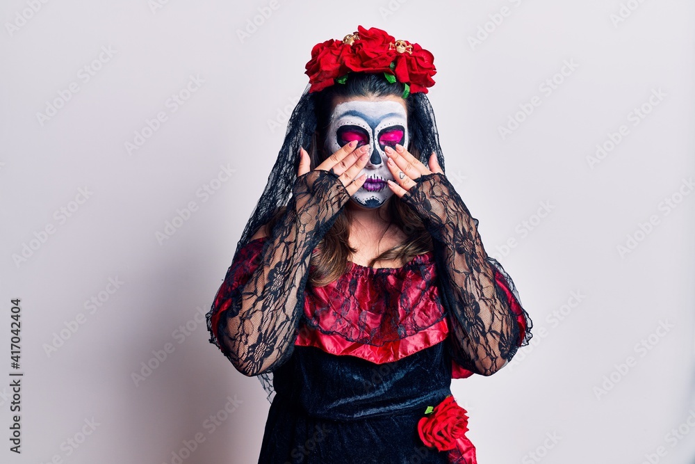 Φωτογραφία Young woman wearing day of the dead costume over white rubbing eyes for fatigue and headache, sleepy and tired expression